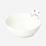 White ceramic kitchen bowl with a cute cat design, 15 cm diameter, from Flying Tiger Copenhagen.