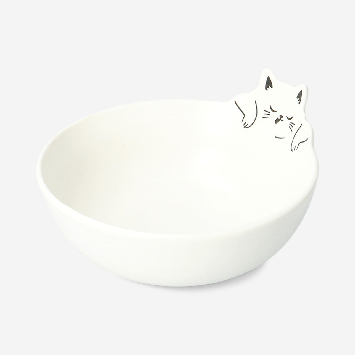 White ceramic kitchen bowl with a cute cat design, 15 cm diameter, from Flying Tiger Copenhagen.