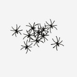 Set of 20 small decorative spiders for party decoration, Flying Tiger Copenhagen, featuring black plastic spider figures.