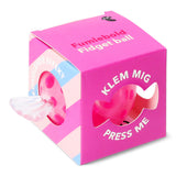 Pink press me toy gadget with a hard candy design and cooling effect, by Flying Tiger Copenhagen.