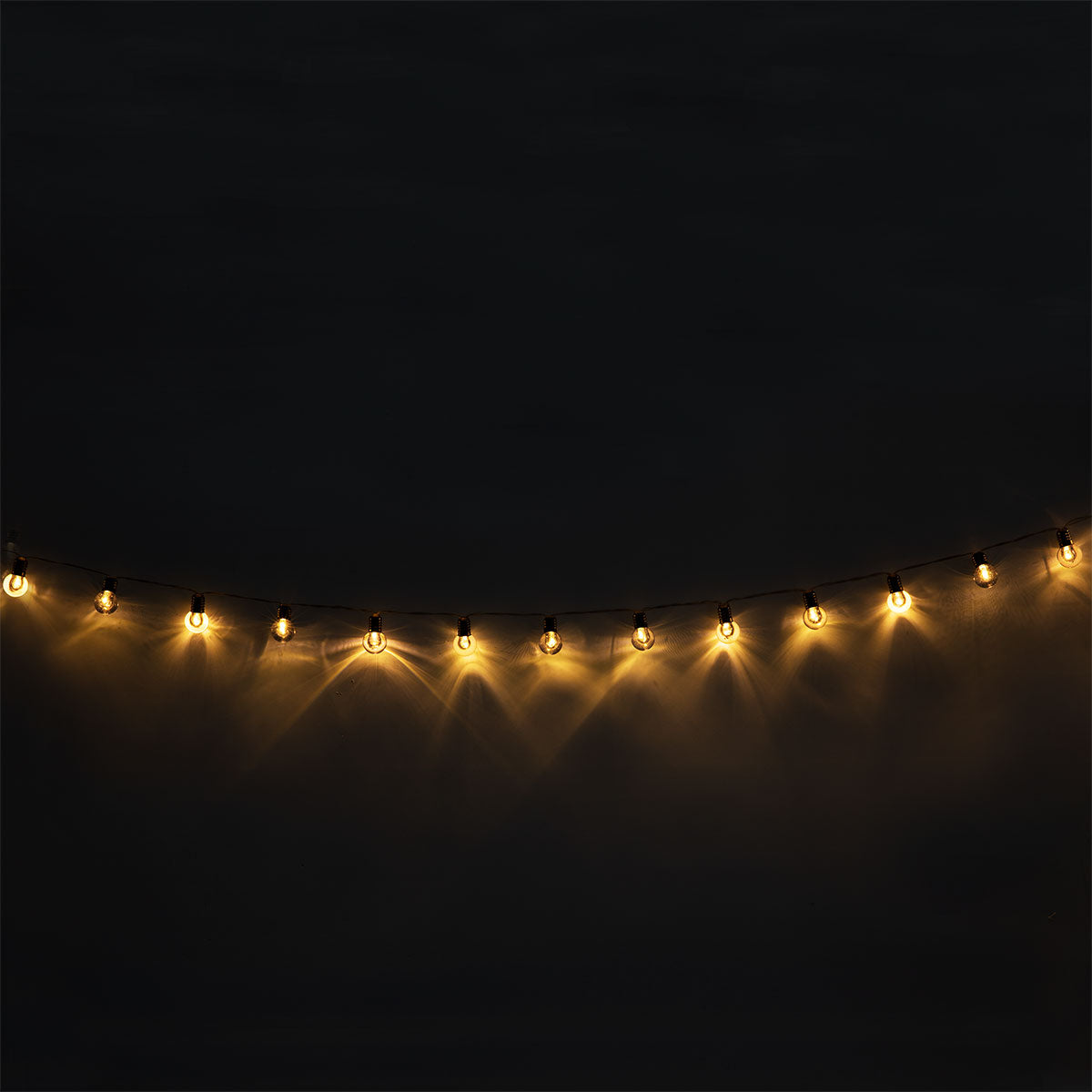String lights with clear bulbs from Flying Tiger Copenhagen, ideal for home decor and ambient lighting.