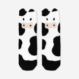 Flying Tiger Copenhagen Comfy Cow socks in size 37/38, soft textile with cow pattern and cozy fit.