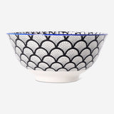 15 cm ceramic bowl with scallop pattern from Flying Tiger Copenhagen, showcasing its decorative design and smooth finish.