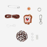 DIY bag charm in the shape of toast bread from Flying Tiger Copenhagen, perfect for adding a fun, whimsical touch to accessories.