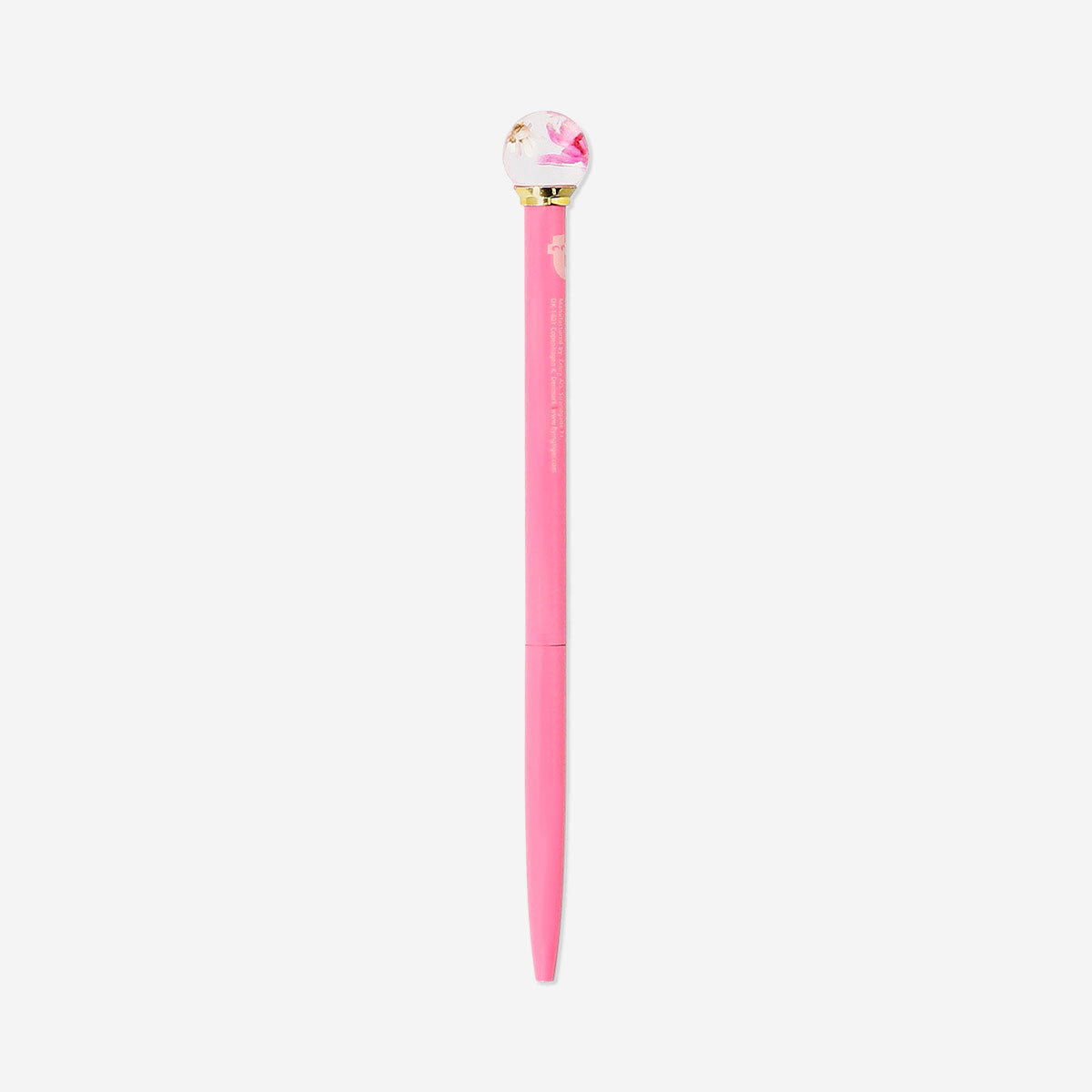 Pink Flying Tiger Copenhagen ballpoint pen with a flower in globe topper, ideal for office use and writing.