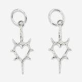Silver spiky heart textile hanging earrings with intricate details, featuring a modern, edgy design from Flying Tiger Copenhagen.