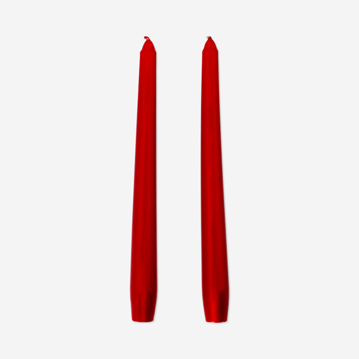 Pair of red dinner candles from Flying Tiger Copenhagen, 2-piece set, perfect for home table décor and ambient lighting.