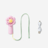 Flying Tiger Copenhagen handheld fan with strap featuring a colorful flower design, compact gadget perfect for on-the-go cooling.