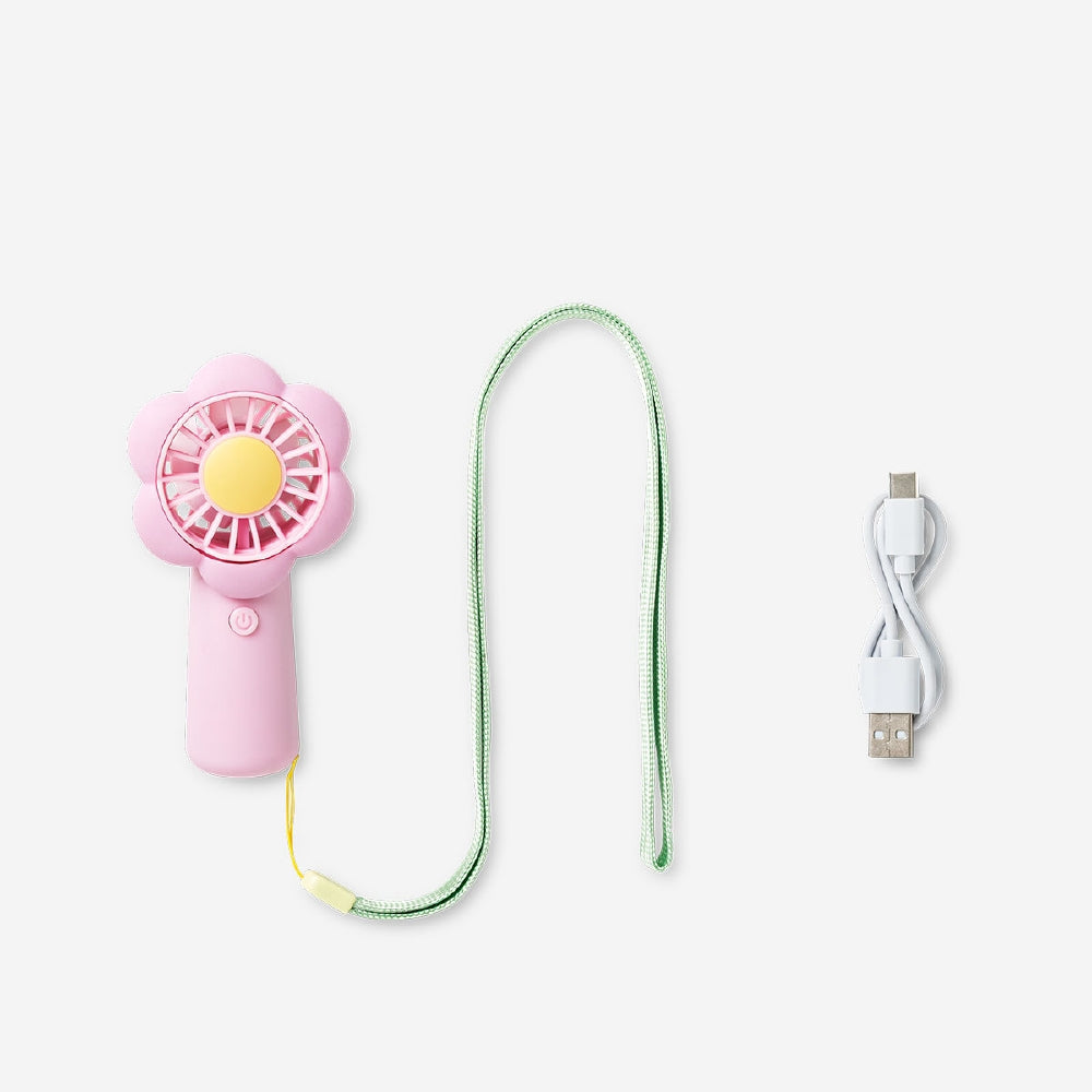 Flying Tiger Copenhagen handheld fan with strap featuring a colorful flower design, compact gadget perfect for on-the-go cooling.