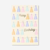 Colorful tassel garland birthday card from Flying Tiger Copenhagen, featuring vibrant paper tassels and festive office decor.