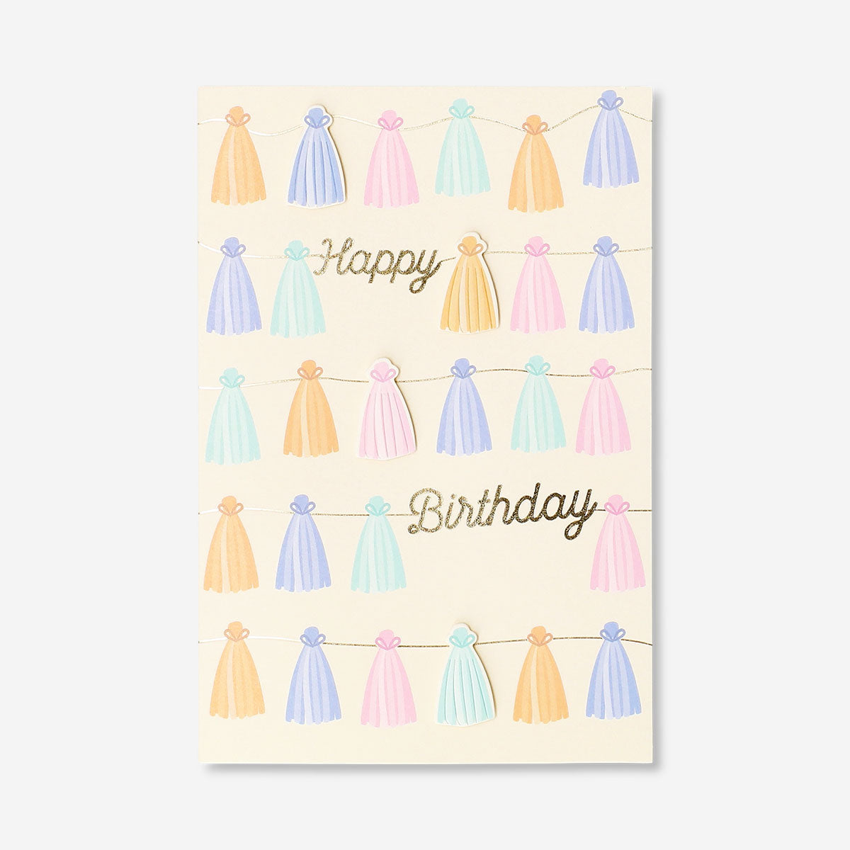Colorful tassel garland birthday card from Flying Tiger Copenhagen, featuring vibrant paper tassels and festive office decor.