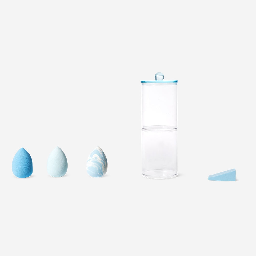 Stackable storage jar for makeup sponges by Flying Tiger Copenhagen, clear plastic container with a lid for organized personal care.