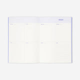 Flying Tiger Copenhagen B5 chequered soft cover weekly planner for office use, featuring a colorful checkered design.