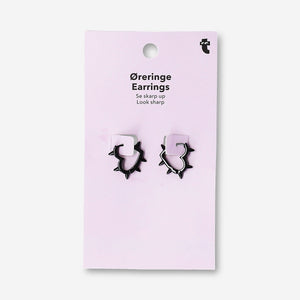 Black studded heart earrings made of textile, featuring a fashionable heart design by Flying Tiger Copenhagen.