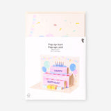 Flying Tiger Copenhagen pop-up birthday cake card featuring colorful birthday cake design for office celebrations.