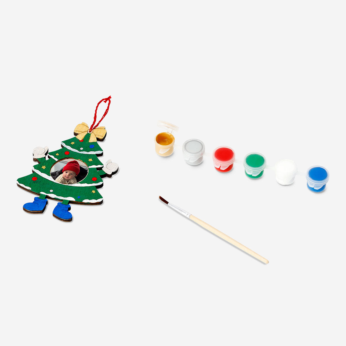 DIY Christmas tree frame hobby kit by Flying Tiger Copenhagen, showing colorful plastic parts and assembly tools for holiday decorating.