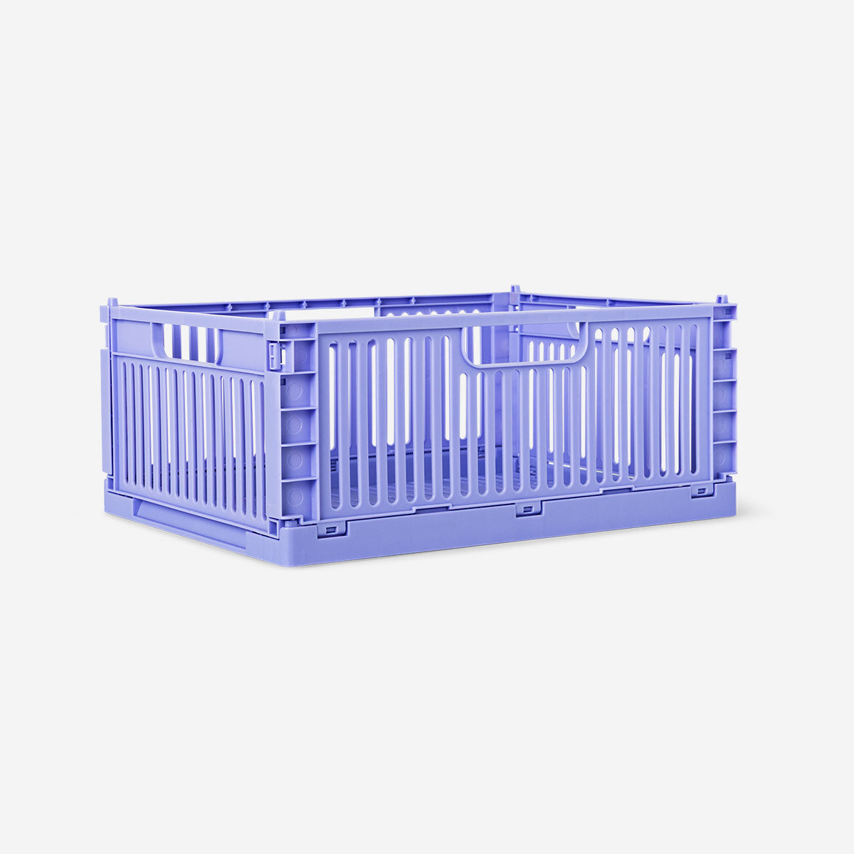 Purple collapsible storage box from Flying Tiger Copenhagen, 30x22 cm, shown folded open with contents inside for home organization.