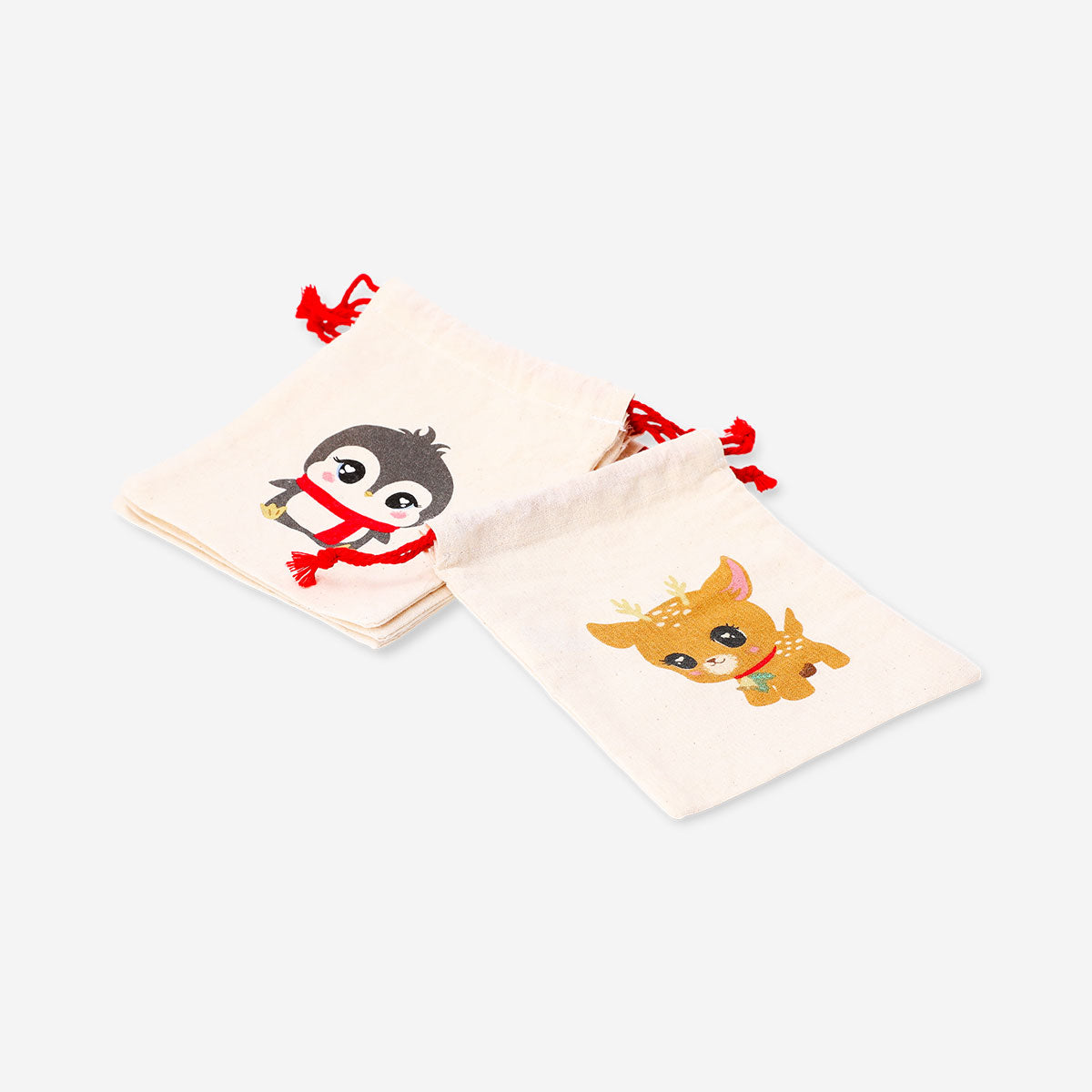 Set of four Flying Tiger Copenhagen cotton gift bags featuring festive Christmas character designs for holiday gifting.