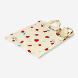 Flying Tiger Copenhagen strawberry print tote bag made of textile, featuring a bright, colorful strawberry pattern on a sturdy fabric.