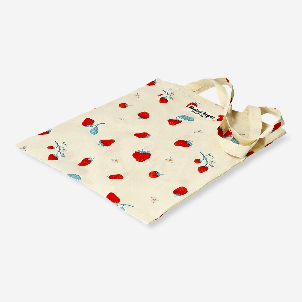 Flying Tiger Copenhagen strawberry print tote bag made of textile, featuring a bright, colorful strawberry pattern on a sturdy fabric.