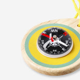 Wooden toy compass from Flying Tiger Copenhagen, featuring a detailed vintage-style design for imaginative play.