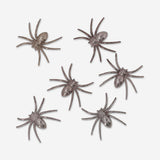 Six decorative metallic spiders for party decor, featuring shiny finishes and detailed designs from Flying Tiger Copenhagen.