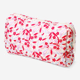 Flying Tiger Copenhagen quilted floral toiletry bag for personal care, with a soft fabric exterior and floral pattern.