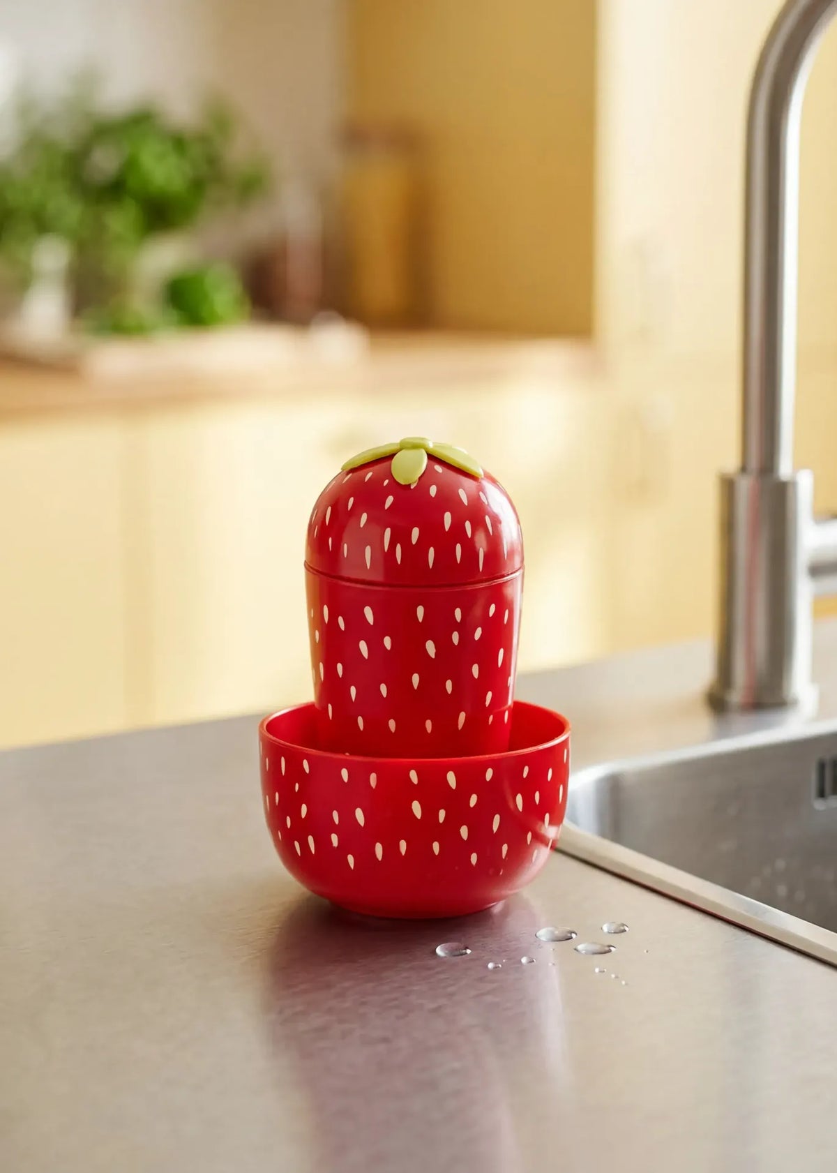 Flying Tiger Copenhagen strawberry-shaped kitchen washing up brush with colorful bristles for dish cleaning.