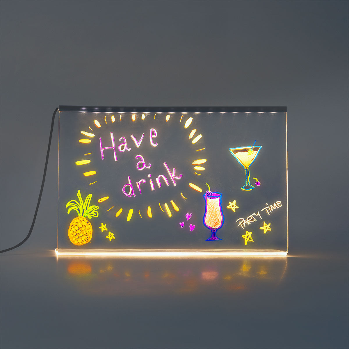 Flying Tiger Copenhagen glowing drawing board gadget with illuminated surface and colorful drawing area for creative fun.
