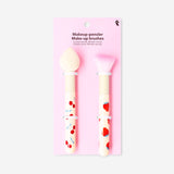 Set of two Flying Tiger Copenhagen makeup brushes with berry print handles for personal care and makeup application.