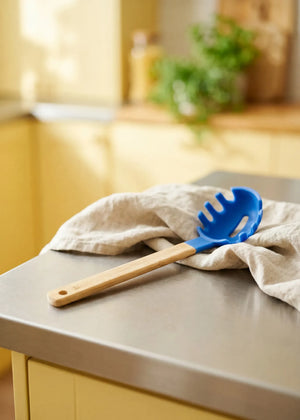Flying Tiger Copenhagen designer spaghetti spoon, 28 cm kitchen utensil with a sleek, modern design for pasta serving.