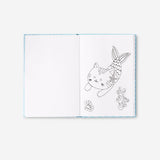 Flying Tiger Copenhagen hobby game in a book, featuring colorful game pieces and illustrated pages for entertainment and fun.