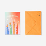 Funny candles birthday card from Flying Tiger Copenhagen featuring humorous candle illustrations for office celebrations.