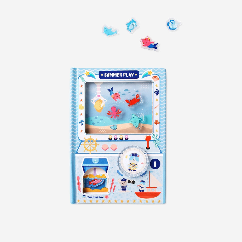Hobby game in a book by Flying Tiger Copenhagen featuring colorful illustrations and interactive gameplay elements.