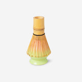 Flying Tiger Copenhagen gradient matcha kit with three kitchen tools, featuring vibrant green and blue hues for preparing matcha tea.