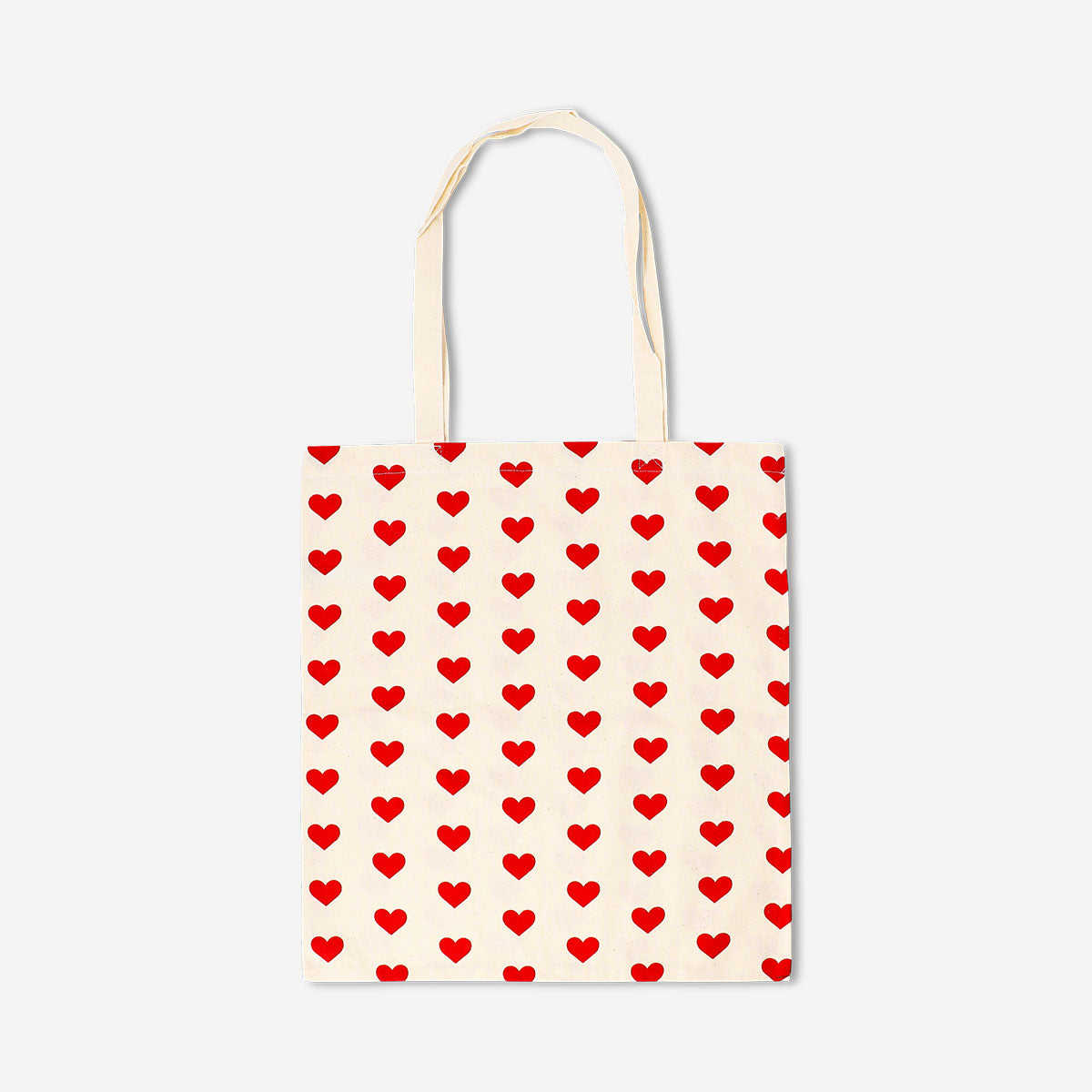 Flying Tiger Copenhagen heart print textile tote bag with sturdy handles and vibrant heart design on natural fabric.