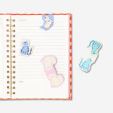 Four cat-themed magnetic bookmarks from Flying Tiger Copenhagen, colorful and cute office accessories for marking pages.