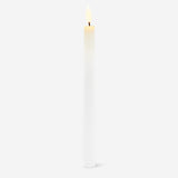 White LED dinner candle for home decor by Flying Tiger Copenhagen, showcasing a sleek, modern flameless candle with a realistic flickering effect.