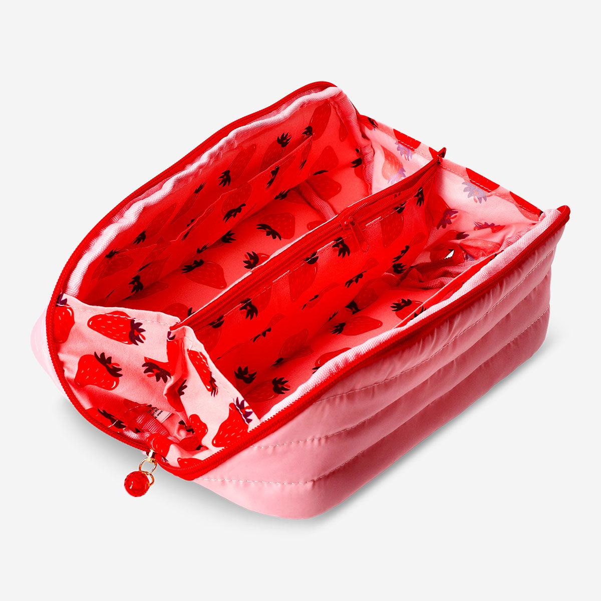 Quilted toiletry bag with strawberry print from Flying Tiger Copenhagen, designed for personal care travel essentials.