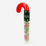 Colorful candy cane-shaped gummies from Flying Tiger Copenhagen displayed on a white surface.