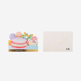 Office birthday card with colorful cake, balloons, and flowers design by Flying Tiger Copenhagen.