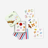 Flying Tiger Copenhagen Look and Find game with colorful game pieces and a playful board for children.