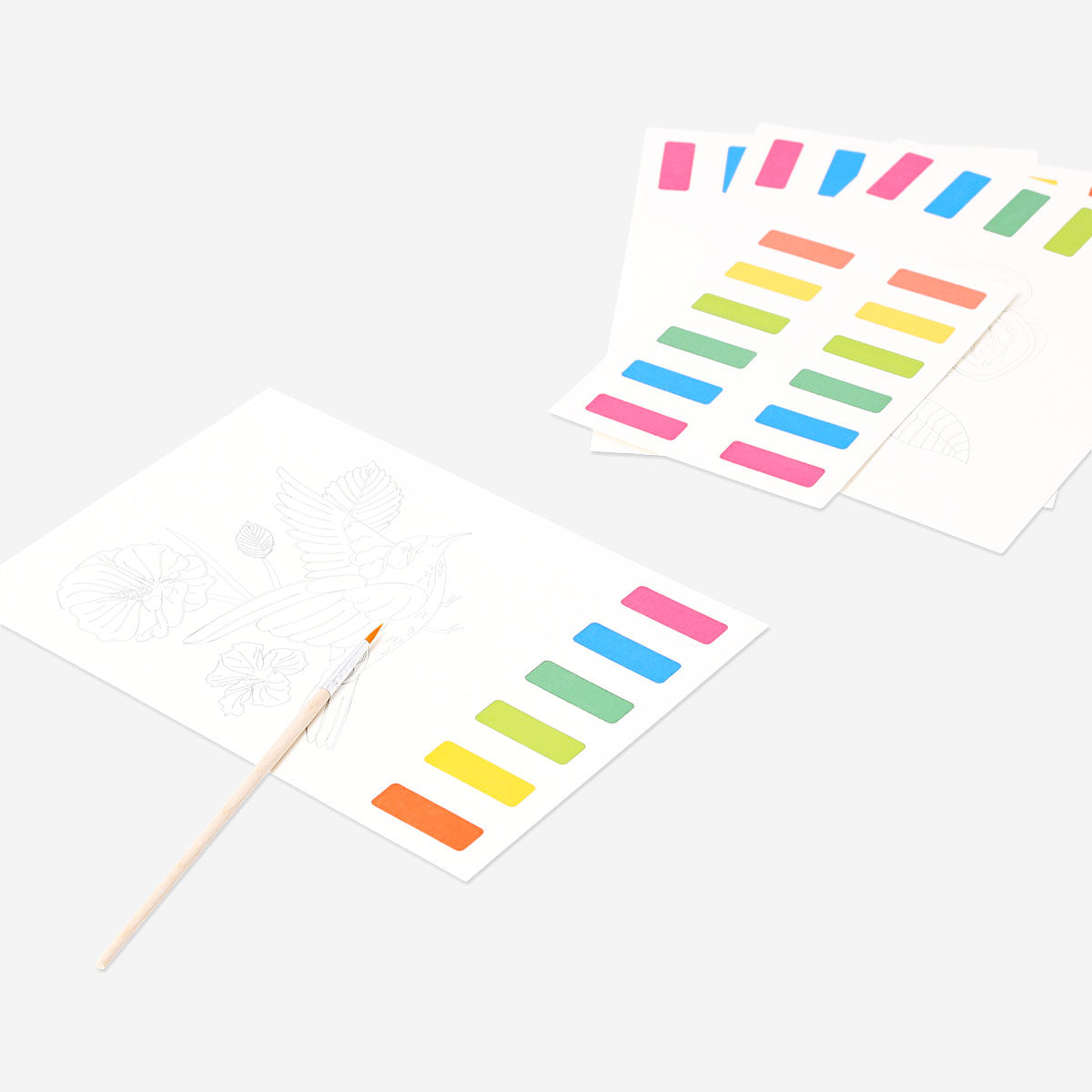 Embossed watercoloring sheets with paint for hobby craft by Flying Tiger Copenhagen, featuring colorful, textured paper for creative projects.