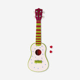 Flying Tiger Copenhagen dragon fruit design ukulele gadget with colorful, tropical-themed artwork and wooden body.