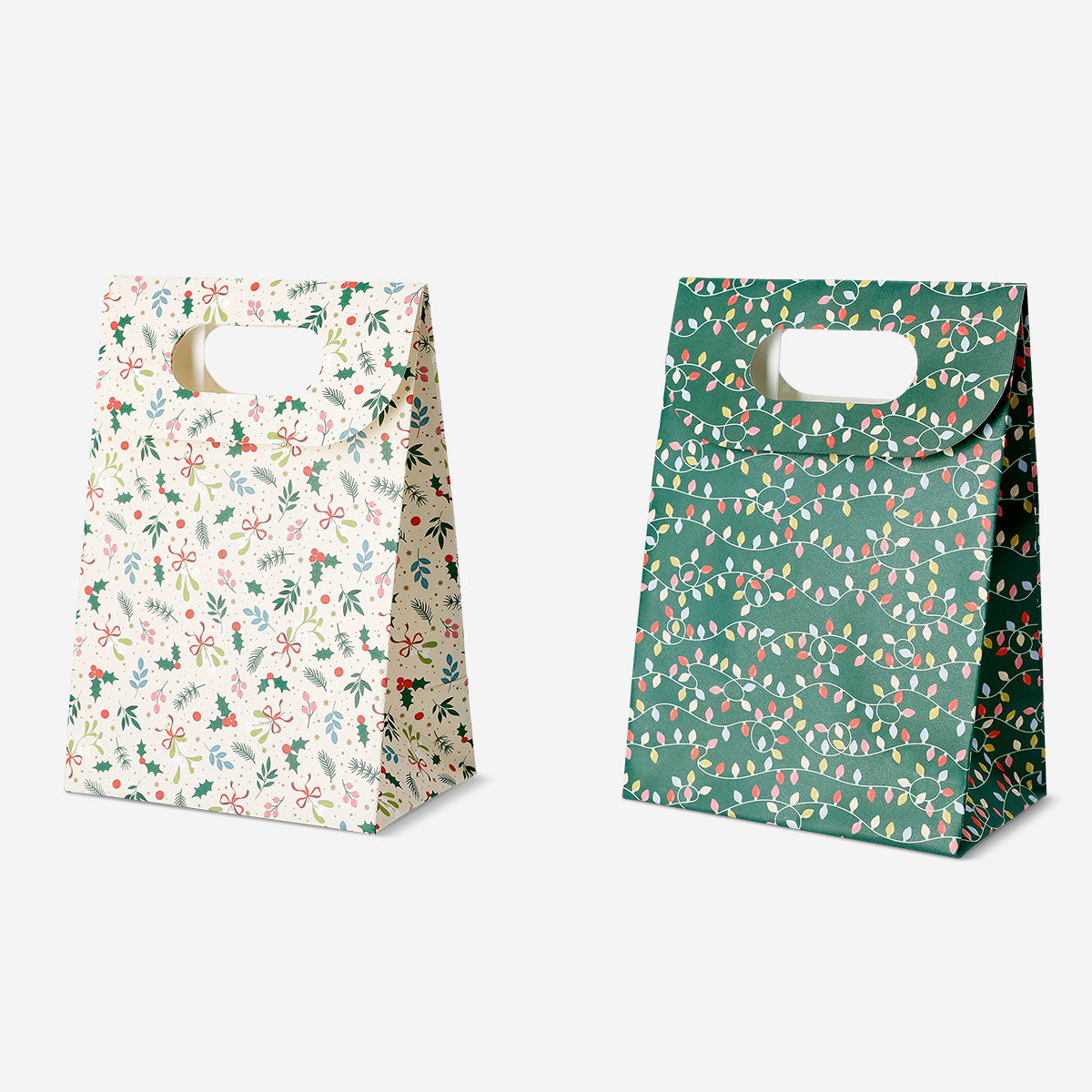 Two Christmas print gift bags for office use, featuring festive holiday designs from Flying Tiger Copenhagen.