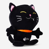 Black cat playing with a Flying Tiger Copenhagen pet leisure toy, designed for cats to enjoy interactive play.