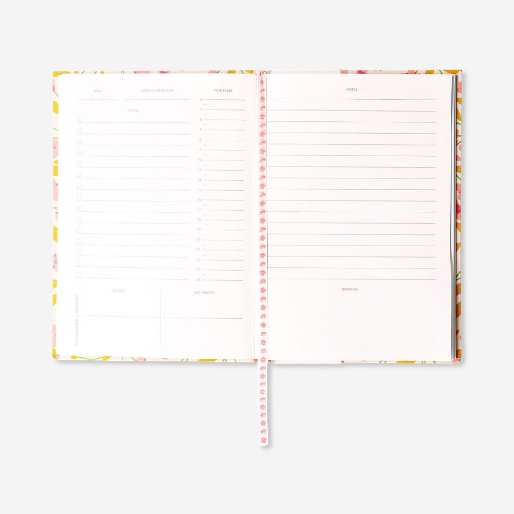 Flying Tiger Copenhagen A5 floral planner with colorful flower cover for office organization and daily planning.