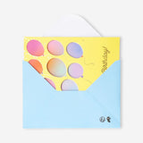 Office birthday card featuring colorful flying balloons design by Flying Tiger Copenhagen, with cheerful balloon illustrations.