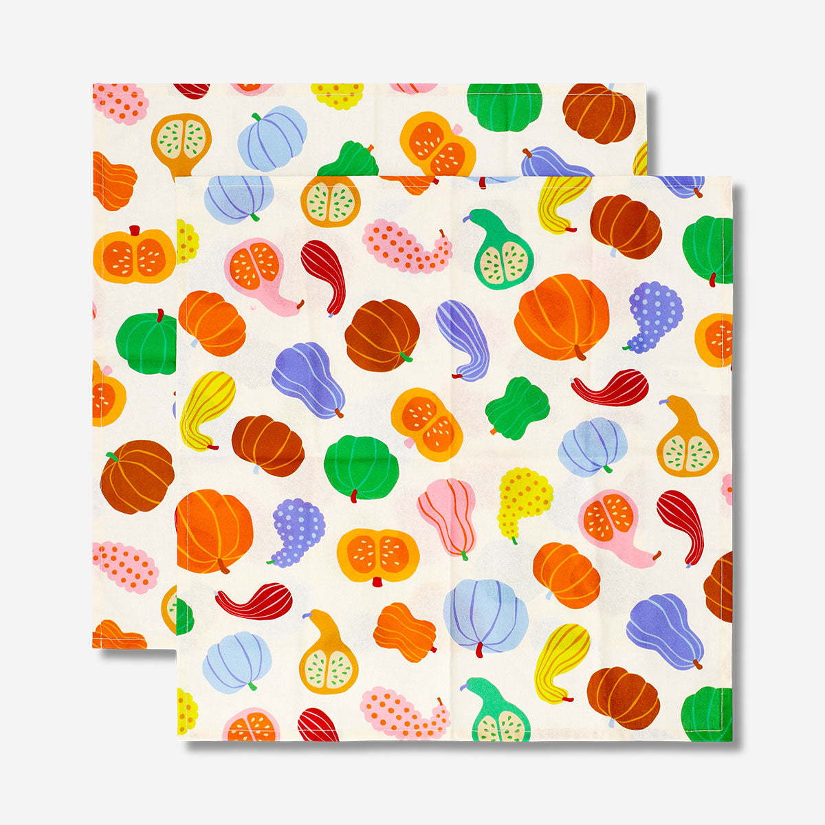 Set of two fabric napkins with orange pumpkin print, ideal for autumn table decor, by Flying Tiger Copenhagen.