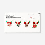 Set of four Flying Tiger Copenhagen wine glass Christmas decorations for kitchen, featuring festive holiday designs.